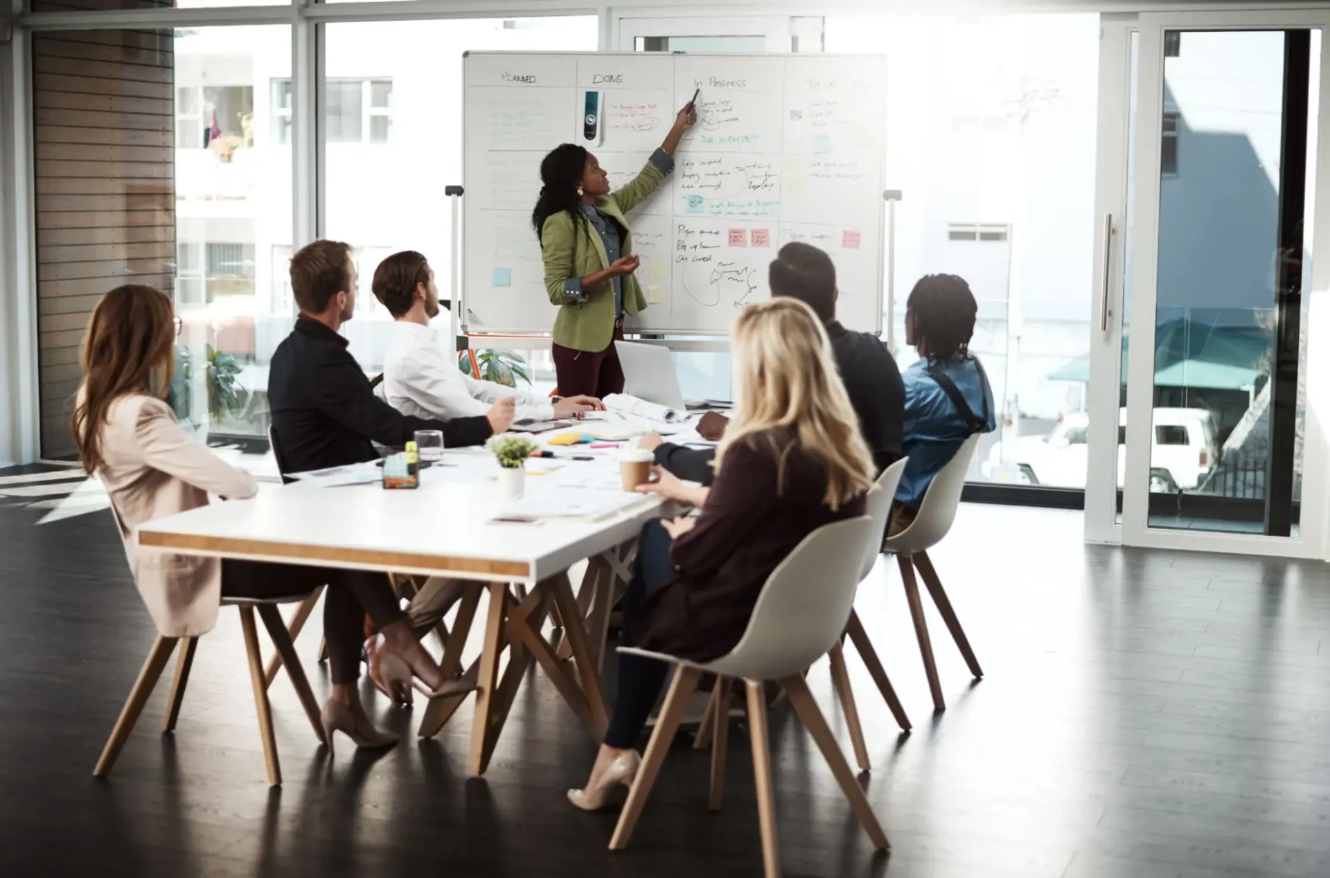 Business meeting with whiteboard presentation